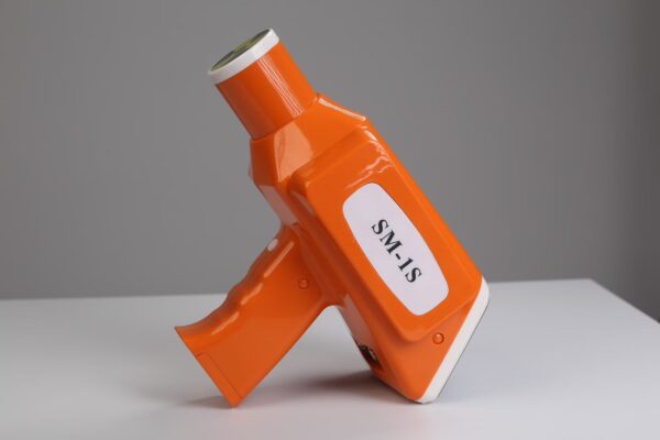 IDEN-X4 handheld dental X-ray unit — orange colour variant, side view