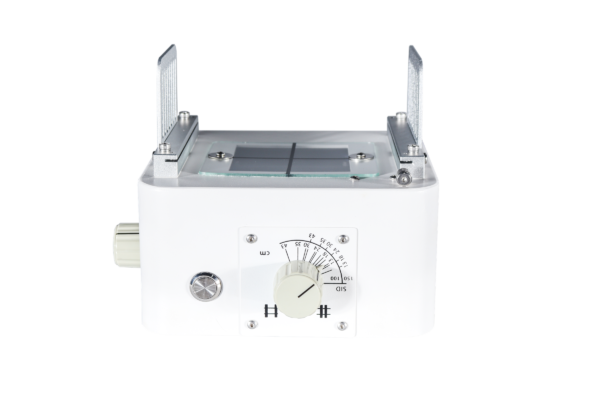 Manual X-ray collimator front view with light field window, cross-hair and the SID and field size dial
