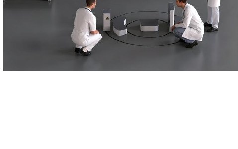 iwa-ct07-scan-1.jpg Operators at the scanning ring