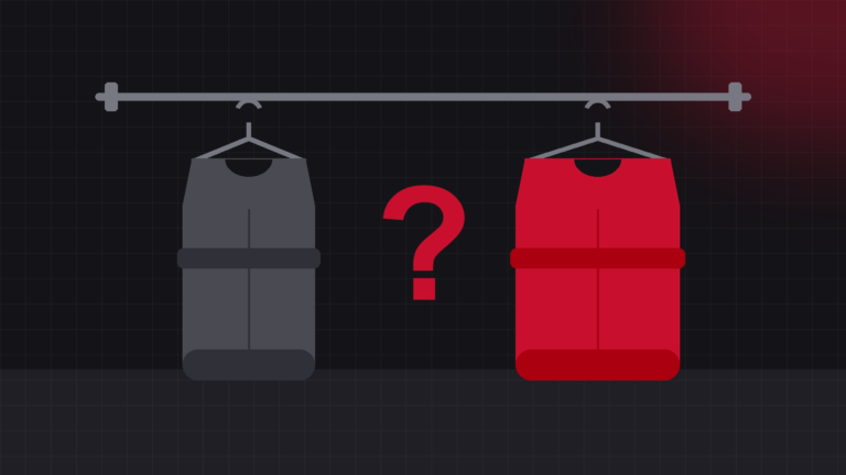 Two lead aprons hanging side by side with a question mark between them