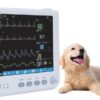 VM9 compact veterinary monitor shown beside a canine patient for scale